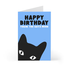 Load image into Gallery viewer, The Cat Birthday Card for Him or Her by R is for Robo showcases a blue background with the phrase "HAPPY BIRTHDAY YOU'RE THE CAT'S MEOW" in bold black and white letters. The bottom half displays a black cat's head with its ears and eyes visible, all printed on heavyweight matte cardstock.