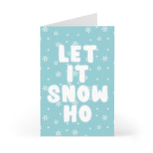 Load image into Gallery viewer, The Let it Snow Ho Sassy Christmas Card by R is for Robo features teal design with white bubble lettering that reads "LET IT SNOW HO," adding a touch of sass. The background is adorned with scattered snowflakes, making it the perfect snarky card for a Merry Christmas.