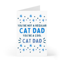 Load image into Gallery viewer, Introducing the "Cat Dad From The Cat - Funny Fathers Day Card" by R is for Robo, featuring the playful message "You're not a regular cat dad, you're a cool cat dad" in blue letters. It's adorned with charming star and dot patterns, making it perfect for leaving a hand-written note to celebrate his purr-fect parenting skills!