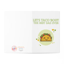 Load image into Gallery viewer, The "Taco Dad - Funny Pun Fathers Day Card for Dad" from R is for Robo features an illustrated taco with a smiling face and is surrounded by hearts. The card's text playfully states, "Let's Taco Bout The Best Dad Ever." At the bottom left, you'll find the RoboRobo logo that adds a fun touch to this delightful card for your favorite taco-loving dad.