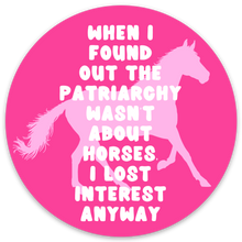 Load image into Gallery viewer, A durable vinyl Barbie sticker by R is for Robo features a pink circle with a horse silhouette and bold white text saying, "Once I found out the patriarchy wasn't about horses, I lost interest." It perfectly embodies girl power with charm and wit.