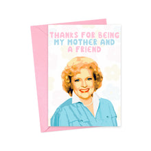 Load image into Gallery viewer, R is for Robo presents the Betty White Mother's Day Card for Mom from Daughter, showcasing an illustration of a smiling older woman reminiscent of Betty White, set against a floral background. The card features the message "Thanks for being my mother and a friend" and comes with a pink envelope—ideal for fans of Pop Culture Gifts.