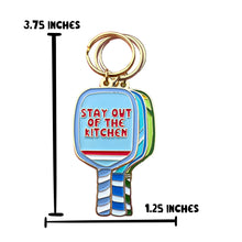 Load image into Gallery viewer, Introducing the Pickleball Paddle Stay Out of the Kitchen Enamel Keychain by R is for Robo—a vibrant pickleball accessory measuring 3.75 inches in height and 1.25 inches in width, perfect as a gift or bag tag for any pickleball enthusiast.