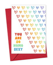 Load image into Gallery viewer, The "Homo Sexy Funny Gay Valentines Day Card or Gay Anniversary Card" by R is for Robo is a delightful choice for a gay Valentine's celebration. It includes a red envelope and features a vibrant pattern of rainbow hearts set against a white background. The playful message, "You are so homo sexy," adds a unique touch to expressing your love.
