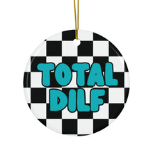 Load image into Gallery viewer, Add a touch of humor to your holiday decor with the DILF Christmas Ornament by R is for Robo. This ornament showcases a striking black and white checkerboard pattern, with bold teal text reading "TOTAL DILF" in the center. It's finished with a gold string for easy hanging, making it an ideal gift for hot dads this festive season.