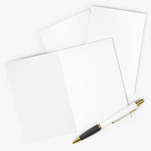 Load image into Gallery viewer, A flat lay image showcases the "Mom Life Funny Mother’s Day Card for Mom or Friend" by R is for Robo, two sheets of paper, and a white pen with gold accents. The card is open, and the items are neatly arranged on a light gray surface.