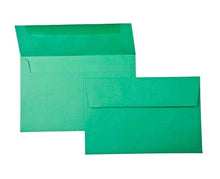 Load image into Gallery viewer, The image features a pair of green envelopes, one positioned slightly ahead of the other, ideally suited for sending a Pickleball Christmas Card from R is for Robo. Both envelopes have their flaps closed and are displayed against a simple white background.