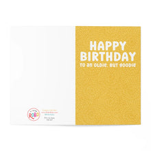 Load image into Gallery viewer, R is for Robo's "Oldie but Goodie Funny Birthday Greeting Card for Him or Her" features a mustard yellow background with the text "HAPPY BIRTHDAY TO AN OLDIE, BUT GOODIE" in white. This card adds humor to your birthday wishes and includes a colorful logo and social media handles on the left side, providing space for your personal handwritten note.
