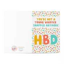 Load image into Gallery viewer, A humorous birthday card featuring vibrant polka dots and bold lettering. The message reads, "YOU'RE NOT A YOUNG WHIPPER SNAPPER ANYMORE HBD." It is paired with a kraft envelope for an authentic feel. The left side displays the R is for Robo logo along with contact information.