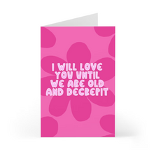 Load image into Gallery viewer, The R is for Robo Funny Valentine's Day Card, also perfect as a Funny Anniversary Card, showcases bold, darker pink flower petals as the background. The front text whimsically states in white font, "I will love you until we are old and decrepit," making it ideal for creating a humorous anniversary moment or adding a heartfelt handwritten note inside.