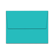 Load image into Gallery viewer, A closed envelope in turquoise on a plain white backdrop, ideal for sending the Pickleball Birthday Card—a humorous birthday greeting for pickleball enthusiasts from R is for Robo.