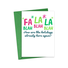 Load image into Gallery viewer, A humorous Christmas card from "R is for Robo" titled "Sarcastic Christmas Card for Him or Her - Funny Christmas Greeting Card," featuring a green envelope. The front displays the phrase "FA LA LA BLAH BLAH BLAH" in playful pink and green text, with the cheeky message "How are the holidays already here again?" in blue text.