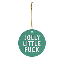 Load image into Gallery viewer, The Jolly Little Fuck Funny Christmas Ornament by R is for Robo is a round green decoration featuring bold white text that reads "Jolly Little Fuck." Ideal for those who enjoy humorous holiday items, this cheeky ornament includes a gold string for hanging, adding a playful edge to your festive decor.