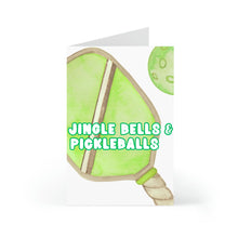 Load image into Gallery viewer, The Pickleball Christmas Card from R is for Robo is a delightful festive card for pickleball enthusiasts, featuring watercolor illustrations of a pickleball paddle and ball. The striking green and white slogan "Jingle Bells & Pickleballs" beautifully encapsulates the essence of a Pickleball Christmas, making it a perfect choice for distinctive pickleball gifts.