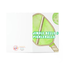 Load image into Gallery viewer, Featuring an illustration of a pickleball paddle and ball on a white background with green text that reads "Jingle Bells & Pickleballs," this card is perfect for pickleball enthusiasts or as an exceptional Christmas greeting. The R is for Robo logo is prominently displayed in the bottom left corner.