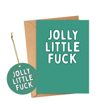 Load image into Gallery viewer, From the R is for Robo collection, the "Jolly Little Fuck Funny Christmas Ornaments for Him or Her" include a green greeting card with white text displaying "JOLLY LITTLE FUCK," ideal as a cheeky Christmas gift. It comes paired with a brown envelope. Additionally, a round green tag featuring the same playful message is attached with string, creating an amusing and bold holiday decor piece.