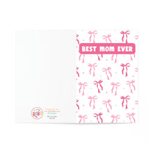 Load image into Gallery viewer, A funny graduation card for women featuring a Coquette Pink Bows pattern from R is for Robo, with BEST MOM EVER in pink on the right and a blank left side displaying the logo and contact info, ideal for heartfelt or humorous messages.