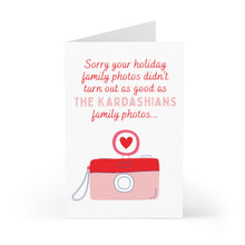 Load image into Gallery viewer, The "Funny Pop Culture Christmas Card for Her" by R is for Robo features a whimsical pink camera illustration with a heart above it. Its heavyweight matte finish perfectly complements the witty text: "Sorry your holiday family photos didn’t turn out as good as THE KARDASHIANS' family photos..." making it ideal for a personalized, hand-written note!