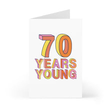 Load image into Gallery viewer, The "70th Birthday Card - Funny Milestone Birthday Card for Him or Her" from R is for Robo features vibrant, 3D lettering that reads "70 YEARS YOUNG," standing out against a simple white backdrop. The inside offers ample room for a personalized, heartfelt message, making it an ideal choice for celebrating this milestone birthday.