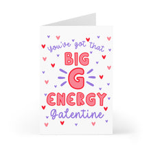 Load image into Gallery viewer, The Big G Energy Funny Galentine's Day Card by R is for Robo stands upright, featuring bold red and purple text that reads "You've got that BIG G ENERGY Galentine." The background is adorned with small red, pink, and purple hearts, making it an ideal choice for a Galentine's Day card.