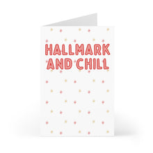 Load image into Gallery viewer, The Hallmark Movies and Chill Funny Christmas Card by R is for Robo features bold red lettering on a sleek white background, with small red and gold asterisk-like stars artistically scattered across, making it ideal for adding a personal handwritten note inside.