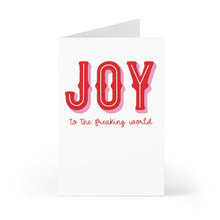 Load image into Gallery viewer, A humorous Christmas card from R is for Robo, named "Joy to the Freaking World Funny Christmas Card," features a white design with "JOY" in bold red letters and "to the freaking world" playfully written below in smaller script. The card is partially open, inviting you to add your personal handwritten message.