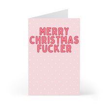 Load image into Gallery viewer, From the brand R is for Robo, the "Merry Christmas Fucker Adult Funny Christmas Card" displays bold red text on a light pink background adorned with small white polka dots. This cheeky holiday card stands open on a crisp white surface, exuding its signature humorous holiday wishes.
