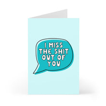 Load image into Gallery viewer, The I Miss You Friendship Card for Best Friend by R is for Robo showcases a speech bubble on a light blue background with the cheeky message "I miss the shit out of you" in white text. It's an ideal card to convey your camaraderie and longing to your best friend.