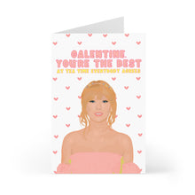 Load image into Gallery viewer, A Taylor Swift Galentine's Day card by R is for Robo, featuring an illustration of a woman with blonde hair wearing a pink off-the-shoulder dress. The white background is embellished with small pink hearts. The card includes the text, "GALENTINE, YOU'RE THE BEST, AT TEA EVERYBODY AGREES," written like a heartfelt handwritten note.