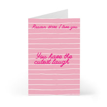 Load image into Gallery viewer, Introducing the "Cute Laugh Funny Valentine's Day Card" by R is for Robo: This pink greeting card features white horizontal stripes and is made from high-quality heavyweight matte cardstock. The card showcases a playful message in a pink stylized font that reads, "Reason #586 I love you: You have the cutest laugh," making it an ideal choice for adding humor to your heartfelt Valentine's Day message.