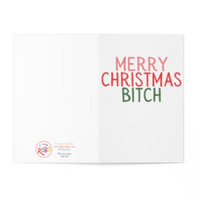 Load image into Gallery viewer, A humorous Christmas card called "Merry Christmas Bitch - Funny Christmas Card for Her" by R is for Robo features the cheeky text "Merry Christmas Bitch" on a white background in bright red and green letters. The bottom left corner displays a circular logo with printing details, making it ideal for personalizing with a cheeky handwritten note inside.