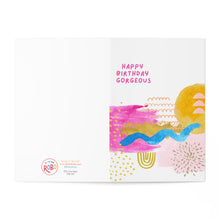 Load image into Gallery viewer, The Happy Birthday Gorgeous Abstract Art Artsy Birthday Card from R is for Robo features a lively design with abstract pink, blue, and yellow shapes. It includes a hand-written note that says "Happy Birthday Gorgeous," with the brand logo and printing details at the bottom left corner.