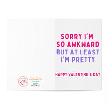 Load image into Gallery viewer, The Awkward but Pretty Funny Valentine's Day Card by R is for Robo showcases the message "Sorry I'm so awkward but at least I'm pretty" in vibrant colors on a white background. A handwritten note adds a personal touch, and the logo and website information are located in the bottom left corner.