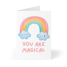 Load image into Gallery viewer, The "You Are Magical Thank You Card" by R is for Robo features a charming rainbow with smiling clouds on either side, proudly displaying the words "You Are Magical." The delightful pastel shades of pink, yellow, and orange stand out against the white background, making it an ideal choice for sharing a heartfelt handwritten message.