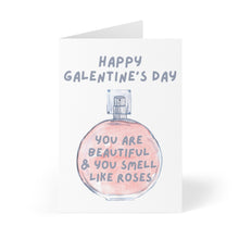 Load image into Gallery viewer, Introducing the "You Smell Like Roses Galentine's Day Card" from R is for Robo, featuring a delightful watercolor illustration of a perfume bottle. It comes with the lovely message, "Happy Galentine's Day. You are beautiful & you smell like roses," and includes a personal handwritten note inside to touch hearts.