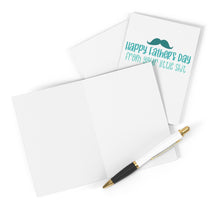 Load image into Gallery viewer, A top-down photo highlights two R is for Robo's "Little Shit Funny Father's Day Card," humorously featuring a mustache design and the message "Happy Fathers Day from your little shit." Accompanied by a black and white pen for your personalized note, this card perfectly embodies the playful spirit of Father's Day!