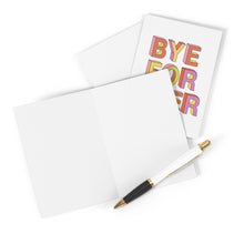 Load image into Gallery viewer, The Bye Forever Rude Going Away Card by R is for Robo lies open, featuring colorful letters spelling BYE FOREVER and a blank interior ready for your personal touch. Beside it, a pen with a gold and black barrel rests on the white background—ideal for creating a humorous farewell card or adding your own handwritten note.