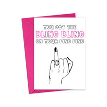 Load image into Gallery viewer, The Ring Finger Funny Engagement Card by R is for Robo features a humorous illustration of a hand with the middle finger extended, adorned with two rings. It includes bold text shouting YOU GOT THE BLING BLING ON YOUR FING FING, with the words BLING BLING highlighted in pink. This lighthearted greeting card comes with a coordinating pink envelope.