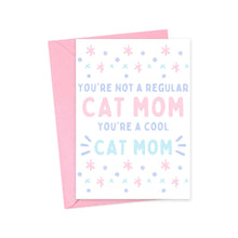 Load image into Gallery viewer, R is for Robo's Cat Mom Mother's Day Card from the Cat Funny features a pink envelope and a message that says, "You're not a regular cat mom, you're a cool cat mom" in pastel colors. It's ideal for celebrating Cat Mother's Day and is adorned with small star and dot patterns.