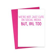 Load image into Gallery viewer, R is for Robo's Cute Valentines Day Card for Boyfriend or Girlfriend comes with a pink envelope and features the message, "WE'RE NOT JUST CUTE ON SOCIAL MEDIA BUT IRL TOO" in bold pink text. It's perfect for adding a handwritten note to make it extra special for your significant other.