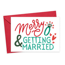 Load image into Gallery viewer, Introducing the Merry & Getting Married Engagement Christmas Card by R is for Robo. This festive card comes with a red envelope and features the text "Merry & Getting Married" in vibrant red and green. It also showcases a charming drawing of an engagement ring surrounded by small red hearts.