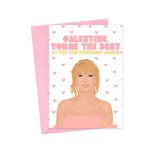 Load image into Gallery viewer, This delightful Taylor Swift Galentine's Day card from R is for Robo showcases a woman with blonde hair in a pink outfit, surrounded by small pink hearts. The card features the phrase, "Gallentine, you're the best at tea time, everybody agrees," reminiscent of Taylor Swift's handwritten notes. It is accompanied by a matching pink envelope.