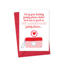 Load image into Gallery viewer, R is for Robo's Funny Pop Culture Christmas Card for Her comes with a red envelope and showcases a whimsical red camera design paired with a heart. The card humorously states, "Sorry your holiday family photos didn't turn out as good as THE KARDASHIANS family photos..." It is printed on heavyweight matte cardstock to provide the ideal surface for a personal handwritten note.