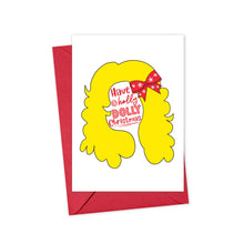 Load image into Gallery viewer, Here's a rephrased version using the given product data:
This humorous Christmas card, perfect for Dolly Parton fans and country music lovers, showcases a bright yellow curly hairstyle adorned with a red bow. The text within the hairstyle reads "Have a holly DOLLY Christmas." Offered by R is for Robo under the name "Dolly Funny Christmas Card for Country Music Lovers," it comes complete with a festive red envelope.