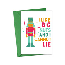 Load image into Gallery viewer, R is for Robo presents the Nutcracker Big Nuts Funny Christmas Card for Him or Her, showcasing a soldier in vibrant red and green with the playful caption "I LIKE BIG NUTS AND I CANNOT LIE" in bold, multicolored letters. The whimsical nutcracker art graces the front of the card, complemented by a partially visible green envelope behind it.