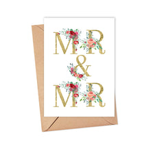 Load image into Gallery viewer, The Mr and Mr Wedding Card by R is for Robo features 'Mr & Mr' in gold lettering accented by red and pink floral designs on high-quality matte cardstock. It includes a brown envelope, ideal for a personal, handwritten message.