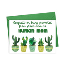 Load image into Gallery viewer, The Plant Mom Funny New Baby Card from R is for Robo includes a green envelope and showcases a playful handwritten message. It reads, "Congrats on being promoted from plant mom to human mom," with illustrations of six potted plants in different green hues, printed on heavyweight matte card stock.