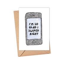 Load image into Gallery viewer, A depiction of a smartphone is featured on the R is for Robo Tinder Online Dating Anniversary Card, with the words "I'm so glad I swiped right" shown on the screen. This card, printed on heavyweight matte paper, comes with a brown envelope, ideal for including a handwritten note to add a personal touch.