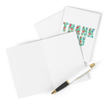Load image into Gallery viewer, Two white Cute Floral Thank You Cards by R is for Robo are displayed. The top card proudly spells out THANK YOU in vibrant floral letters. A black and white pen with gold accents rests beside them, ready to craft a heartfelt handwritten note, all elegantly set against a crisp white background.