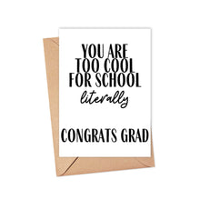 Load image into Gallery viewer, The "Too Cool for School Funny Graduation Card" by R is for Robo features the bold message "You are too cool for school, literally. Congrats grad!" in striking black letters. A personalized handwritten note can be added inside to make it even more special. The card comes propped against a brown envelope, ready to celebrate the graduate's big day.